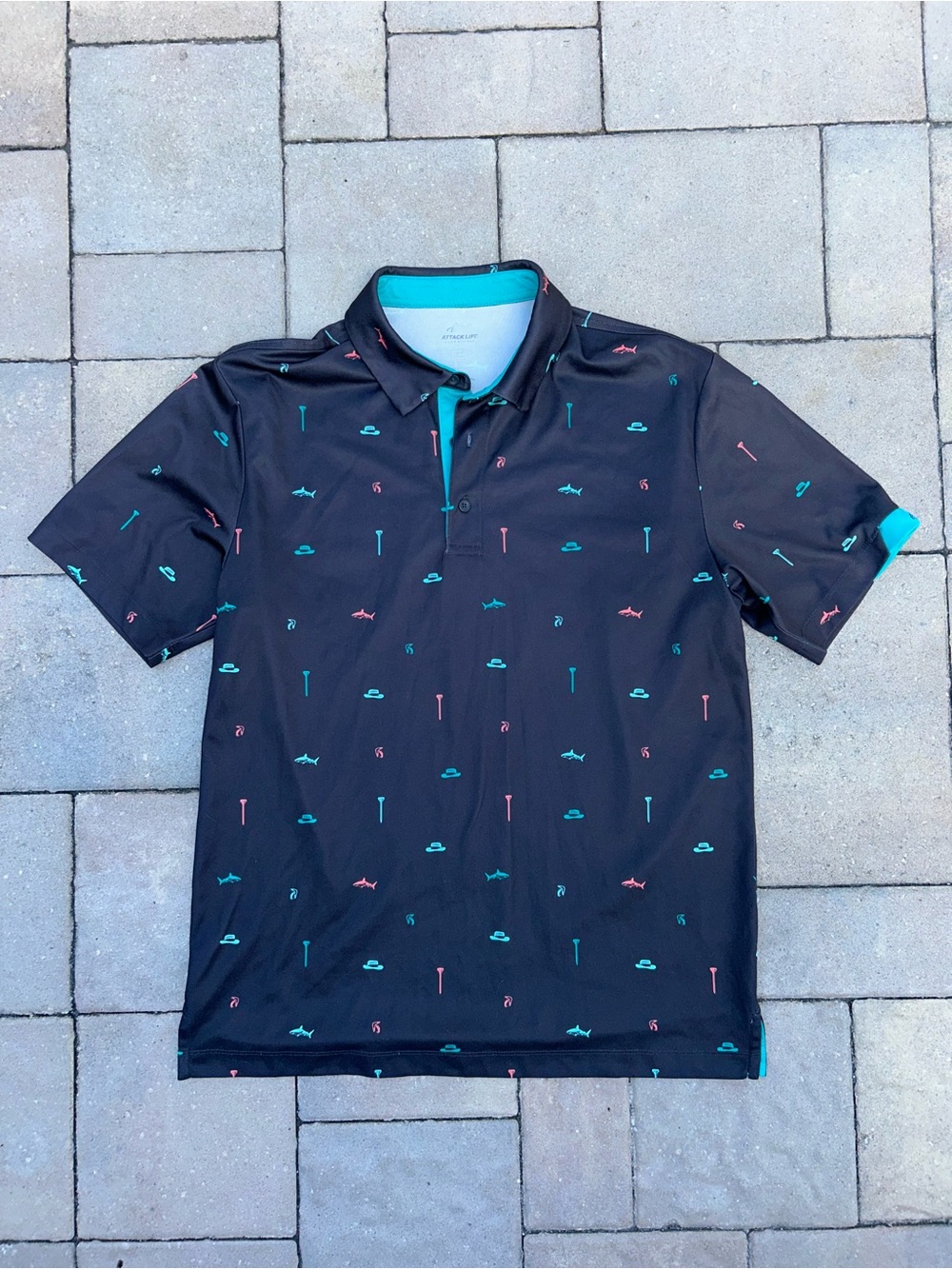 Attack Life by Greg Norman Black Polo with Teal & Coral Micro Print